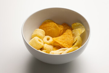 Many Crispy Snacks food potato chip salty. Fast food or junk food snacks unhealthy concept.