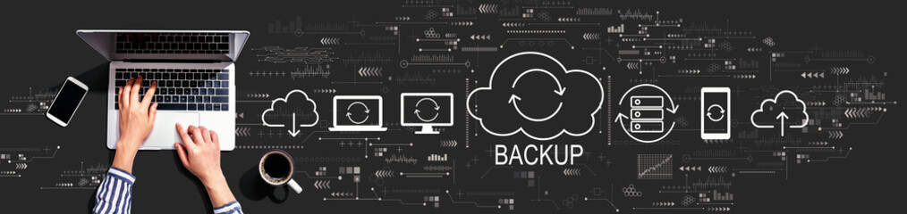 Obraz na płótnie Canvas Backup concept with person using a laptop computer