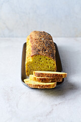 Healthy homemade turmeric bread with blue poppy seeds
