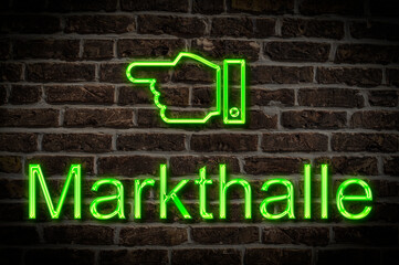 Obraz premium Leuchtreklame Markthalle