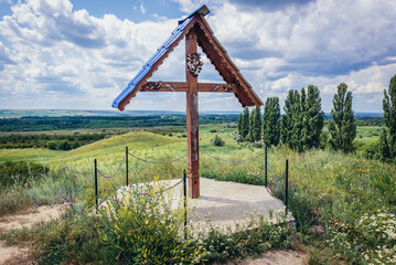 Wooden cross on one of the hills of Suta de Movile - The Hundred Hills nature reserve, Moldova