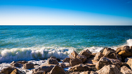 Waves breaking on a stony beach