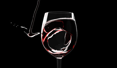 Plakat Macro view of Red wine is poured into a glass with splash on black background