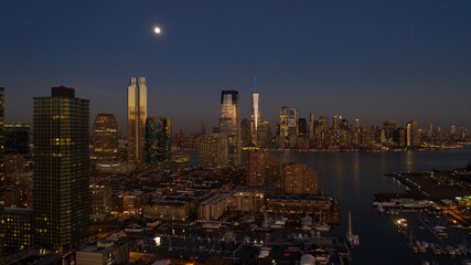 Jersey City Night View of Marina and Hudson River with Manhattan and Financial District 