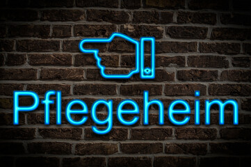 Fototapeta premium Leuchtreklame Pflegeheim