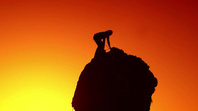 A mountaineer climbs