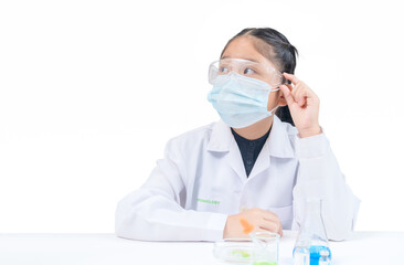 A little scientist is thinking  isolated on white background.