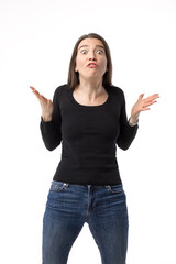 Surprised and disappointed young woman actively gesticulating on the white background.