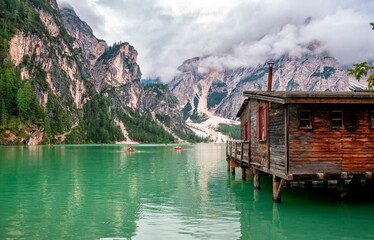 Lake Braies (Lake Prags or Pragser Wildsee) is a lake in the Prags Dolomites in South Tyrol, Italy. Hiking travel and adventure.