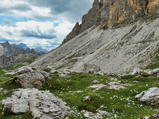 Fototapeta na wymiar Sand below the mountains on the back of the 3 Zinnen in the South Tyrolean Dolomites