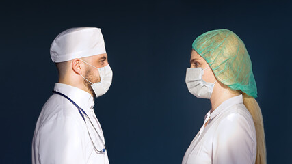 Healthcare, medicine concept: Portrait of female and male doctors, medical mask is protection face,