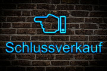 Fototapeta premium Leuchtreklame Schlussverkauf