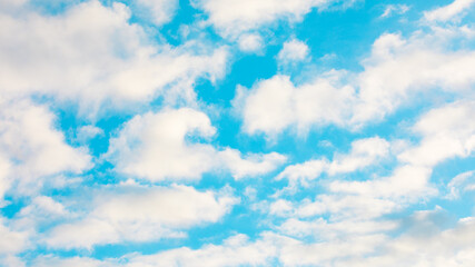 Blue sky and white clouds on a sunny day. Nature background.