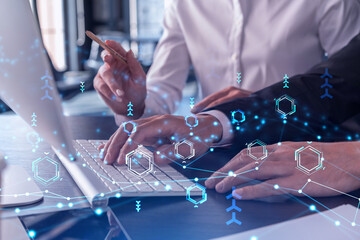 Two information technology specialist brainstorming on project to create a new approach to develop...