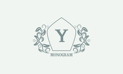 Vintage graceful floral monogram with initials Y. Heraldic logo symbol with exclusive calligraphic design elements in gray tones. Business sign, identity for hotel, restaurant, jewelry.