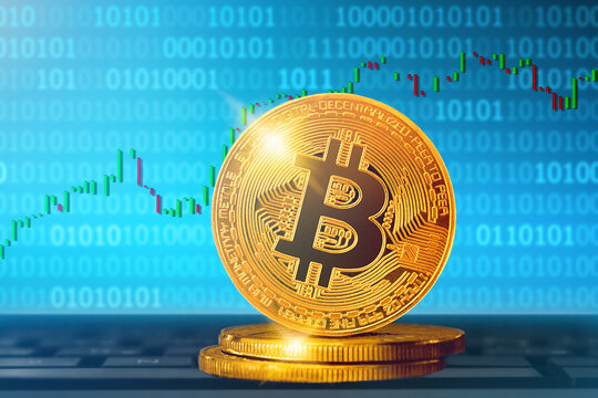 Bitcoin cryptocurrency; bitcoin BTC golden coin on the background of the chart