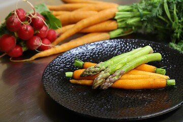 Carrots and asparagus. Fresh Vegetables in the kitchen from the garden.