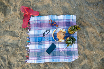 Organic coconut and pineapple on the beach
