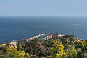 Fototapeta premium Aerial view of the small port of Theoule-sur-Mer on the Mediterranean coast of France. 