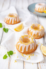 Mini lemon bundt cakes topped with lemon glaze