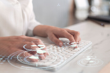 Woman typing the keyboard to create innovative software to change the world and provide a completely new service. Close up shot. Hologram tech graphs. Concept of Dev team. Formal wear.