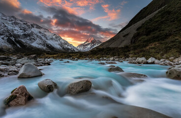 Amazing sunset at Hooker River overlooking Mount Cook in New Zealand
