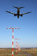 twin-engine jet on short final for international airport