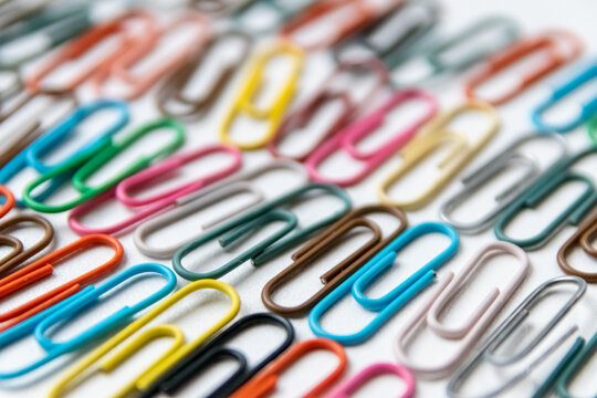 Many Colorful Paper Clips On A Home Office Desk For Stationary Design As Colorful Pattern To Tidy Desk, Papers And Paperwork To Attach Attachments To Files And Documents Or Collection Of Office Supply