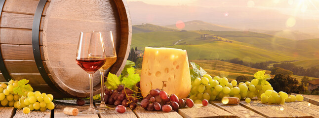 Fresh Grapes And Wine With Cheese On The Background Of An Italian Landscape. Tuscany Region - obrazy, fototapety, plakaty