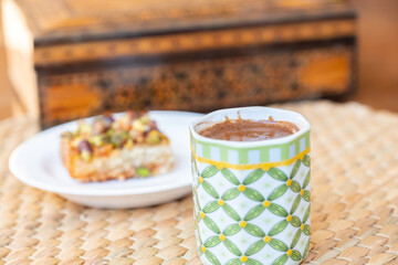 Traditional hrysh with coffee are served during Eid al adha or fitr celebration and ramadan , turkish, arabian, asian