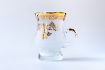 Empty tea glass isolated on white background, empty traditional tea cup 
