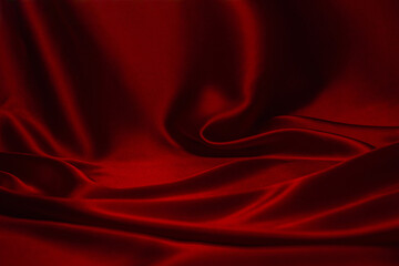 Red silk or satin luxury fabric texture can use as abstract background.