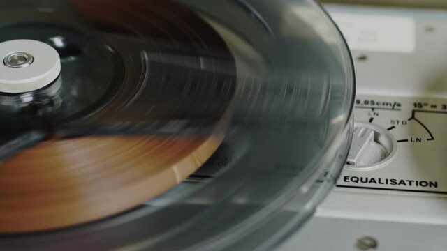 Old vintage reel-to-reel player. Tape recorder with spools. Bobbin tape recorder.	
