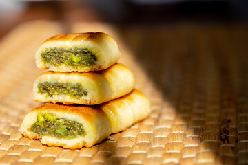 Arabic sweets, maamoul and coffee on traditional background