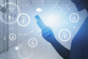 Profile of woman with phone, double exposure of network