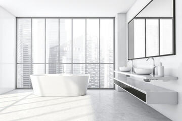 Light bathroom with sinks and windows