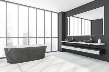 Dark bathroom with sinks and windows