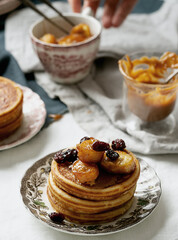 Classic American breakfast pancakes with various toppings