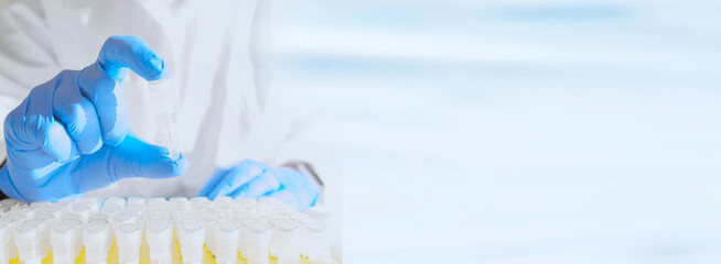 Doctor or nurse with patient sample tube for DNA testing. Laboratory research or pharmacy banner with copy space. drug development and patient screening in science