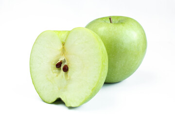 One whole and a half apple isolated on white background. Green fruit sliced