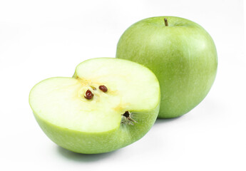 One whole and a half apple isolated on white background. Green fruit sliced