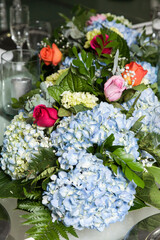Social events room decorated with hydrangea flowers.