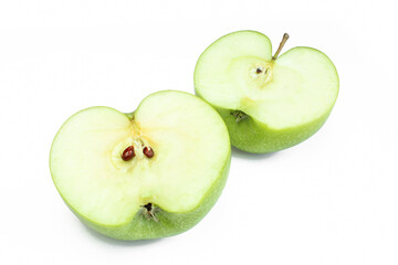 Two halfs and one whole green apple isolated on white background. Sliced fruit