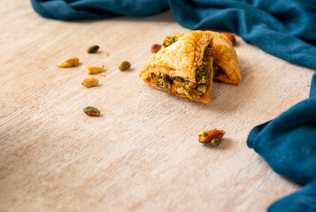 Arabic sweets named baklava filled with pistachio