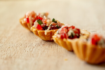 Valentine cupcakes with red colors and brown background