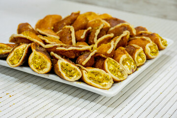 Ramadan sweets qatayef with white background