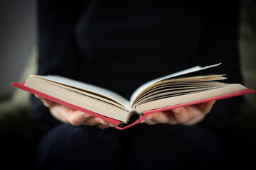 Women hand open book for reading, concept background