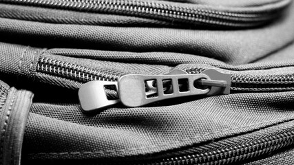 Close-up suitcase zipper, black and white