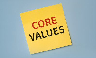 Core values word on a yellow sticker against blue baclground.business concept