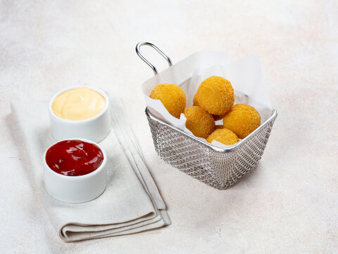 Fried Cheese balls with sauce tomato and mayonnaise 
